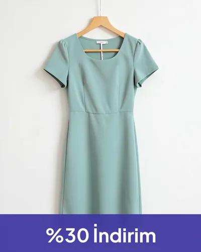 Boutique, after: the same dress against a white wall with a “30% off” band