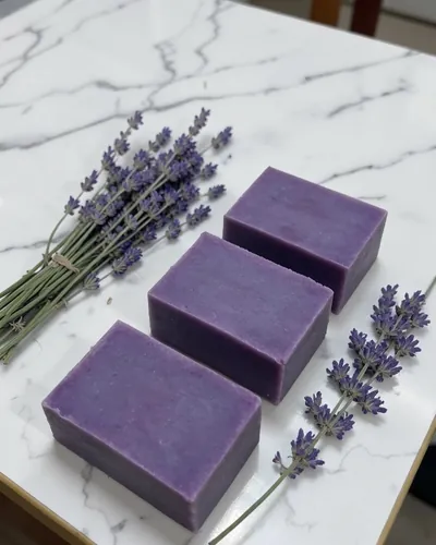 Soap workshop, after: the soaps on a marble counter with lavender sprigs